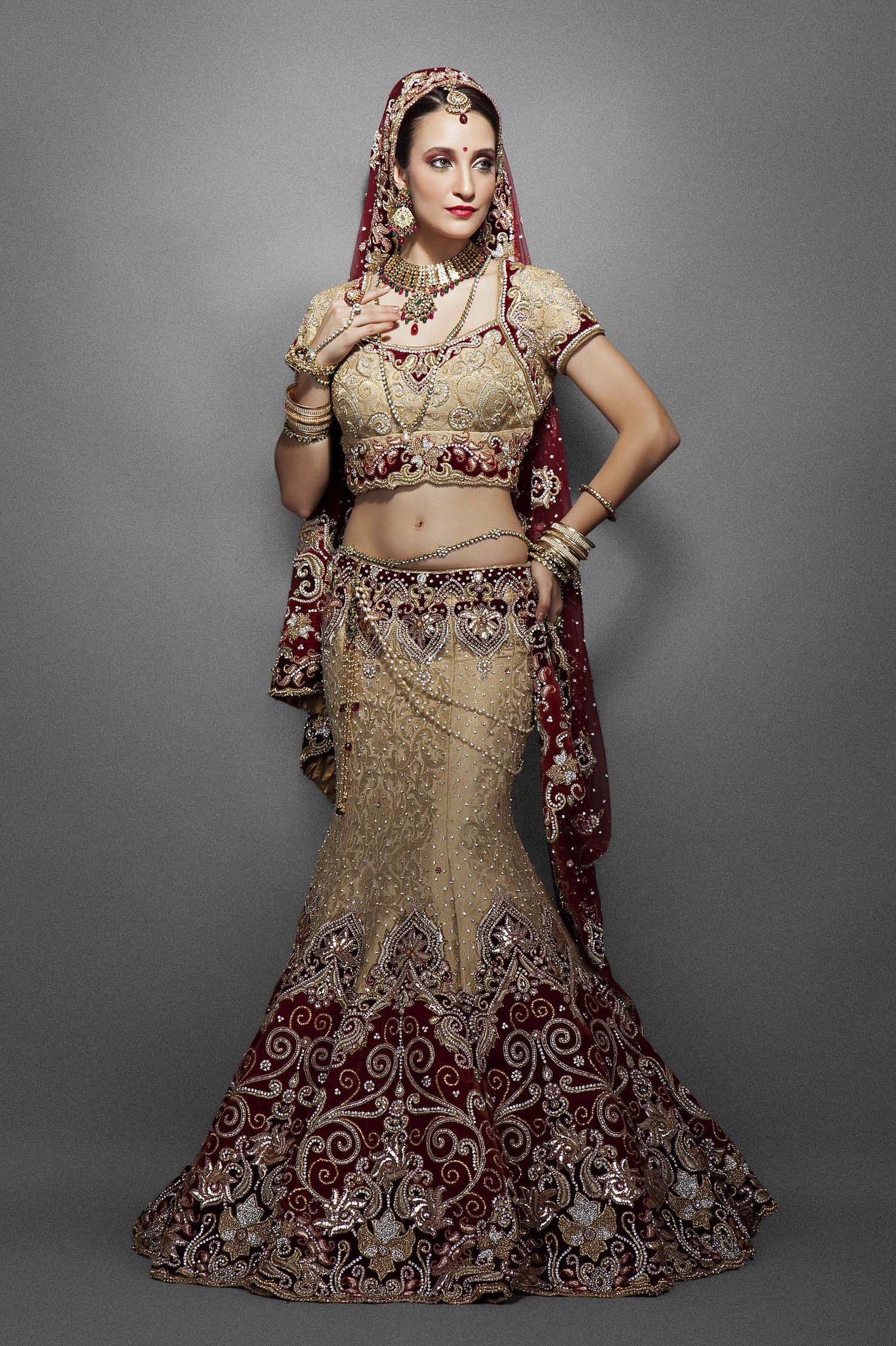 Gold brocade bridal Lehenga with traditional embroidery