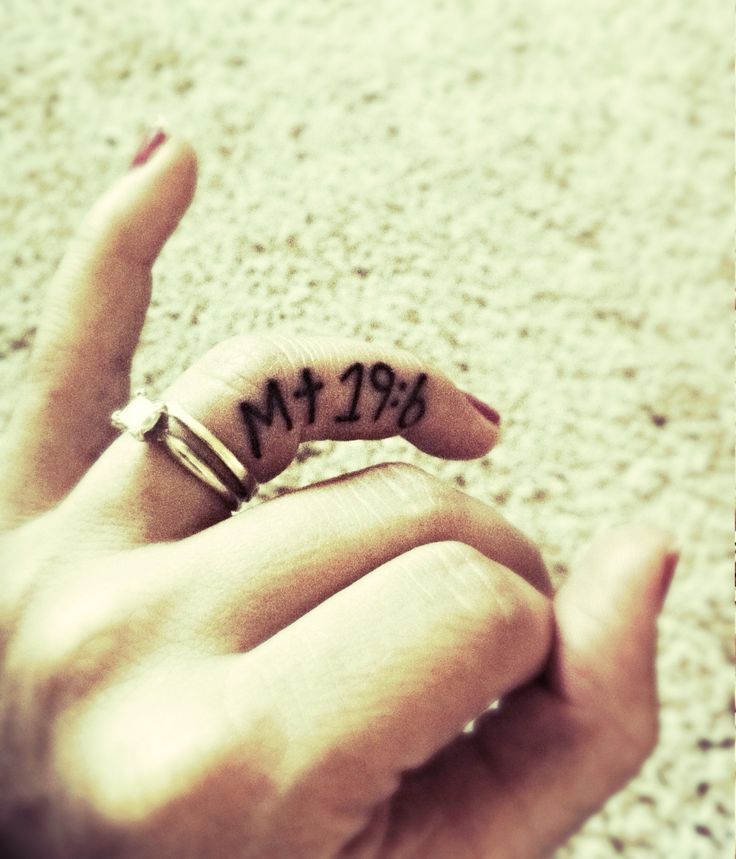 Ring finger tattoo