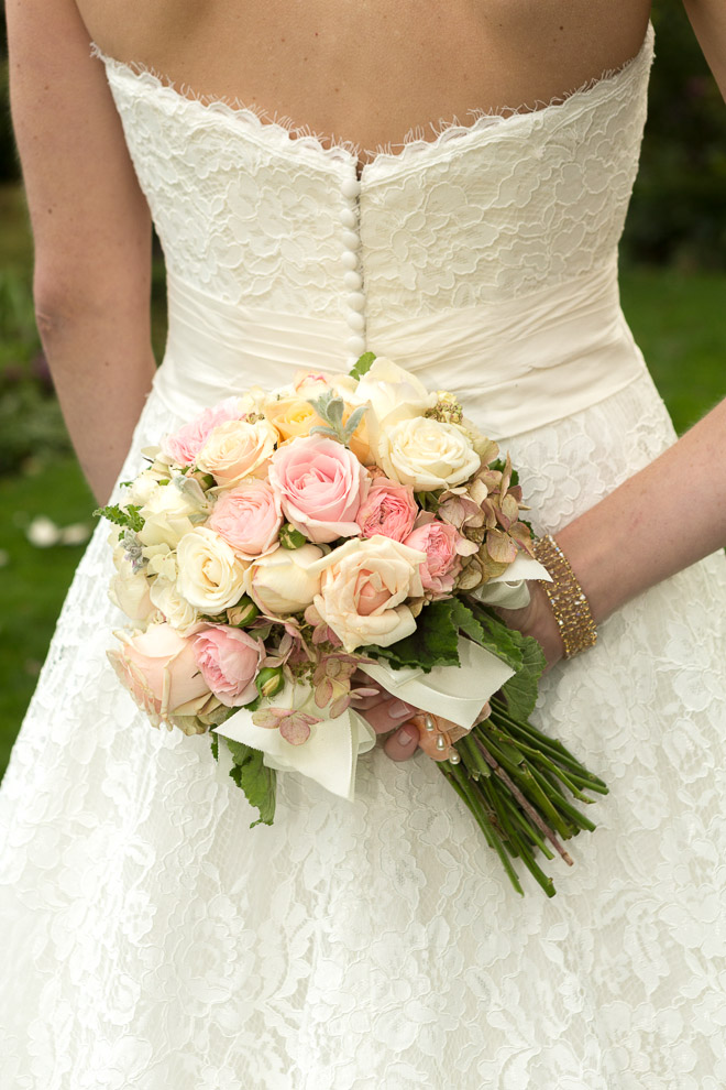 bridal-bouquet-and-beautiful-dress-by-vases-wild-image-by-daniel-sheehan