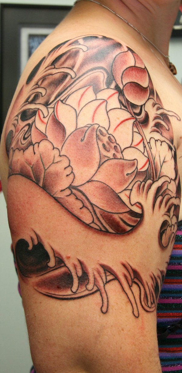lotus flower backpeice tattoo
