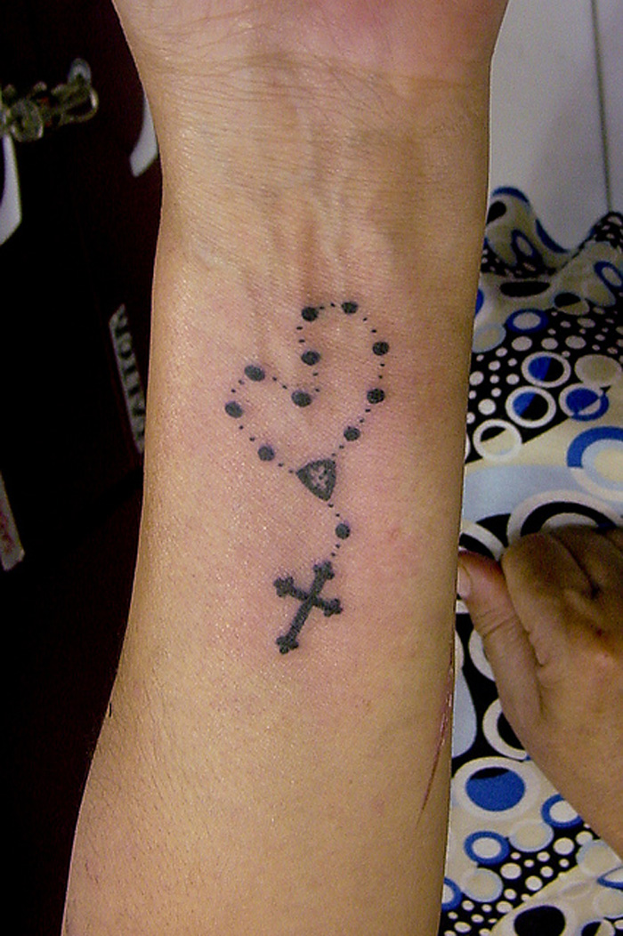 rosary-tattoo-design-on-wrist-for-male-and-female