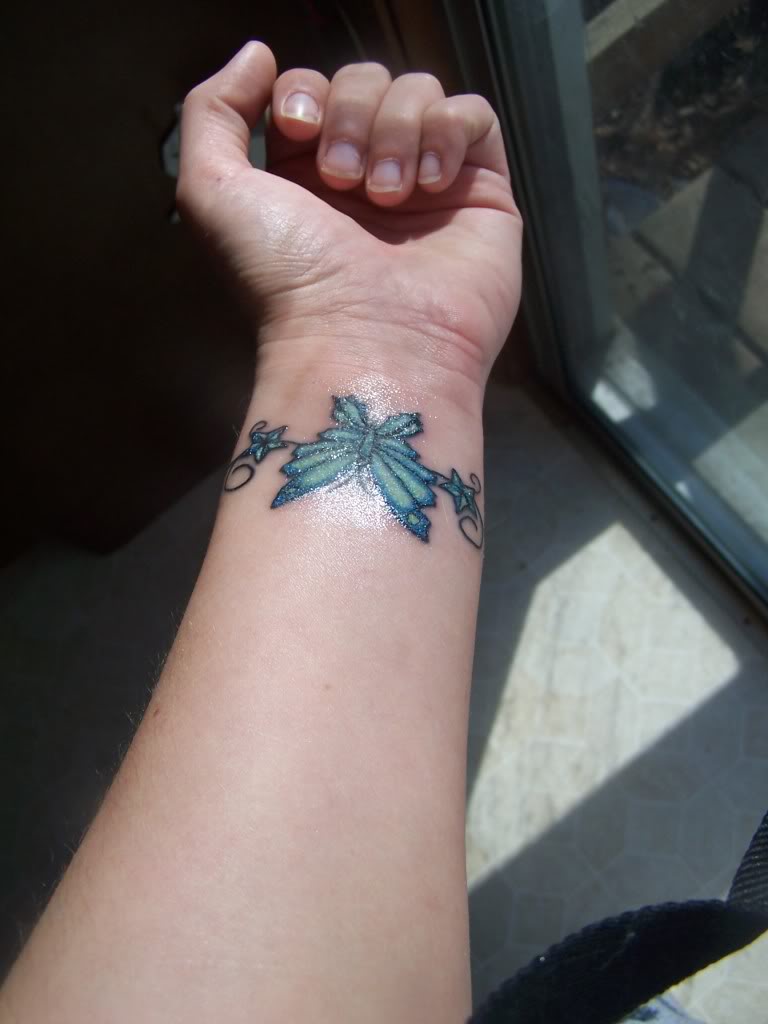 small-tribal-butterfly-tattoos-on-wrist