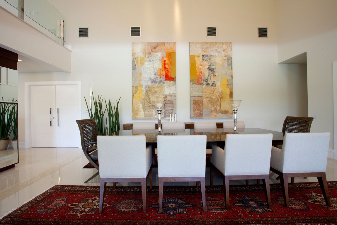wonderful-dining-room-with-twin-art-painting-on-white-wall-also-large-brown-dining-table-combine-arranged-white-chairs-in-red-pattern-carpet-for-painting-a-large-room-ideas-painting-a-large-room-home