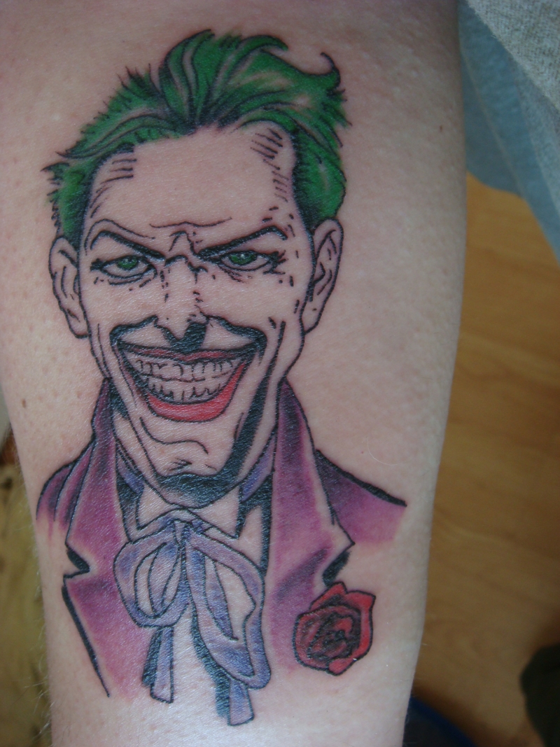 Joker Tattoo with Red Rose