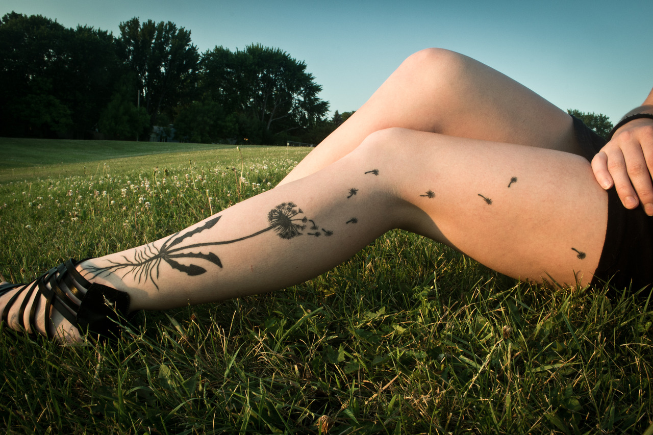 My dandelion tattoo in the field where I used to braid dandelion crowns as