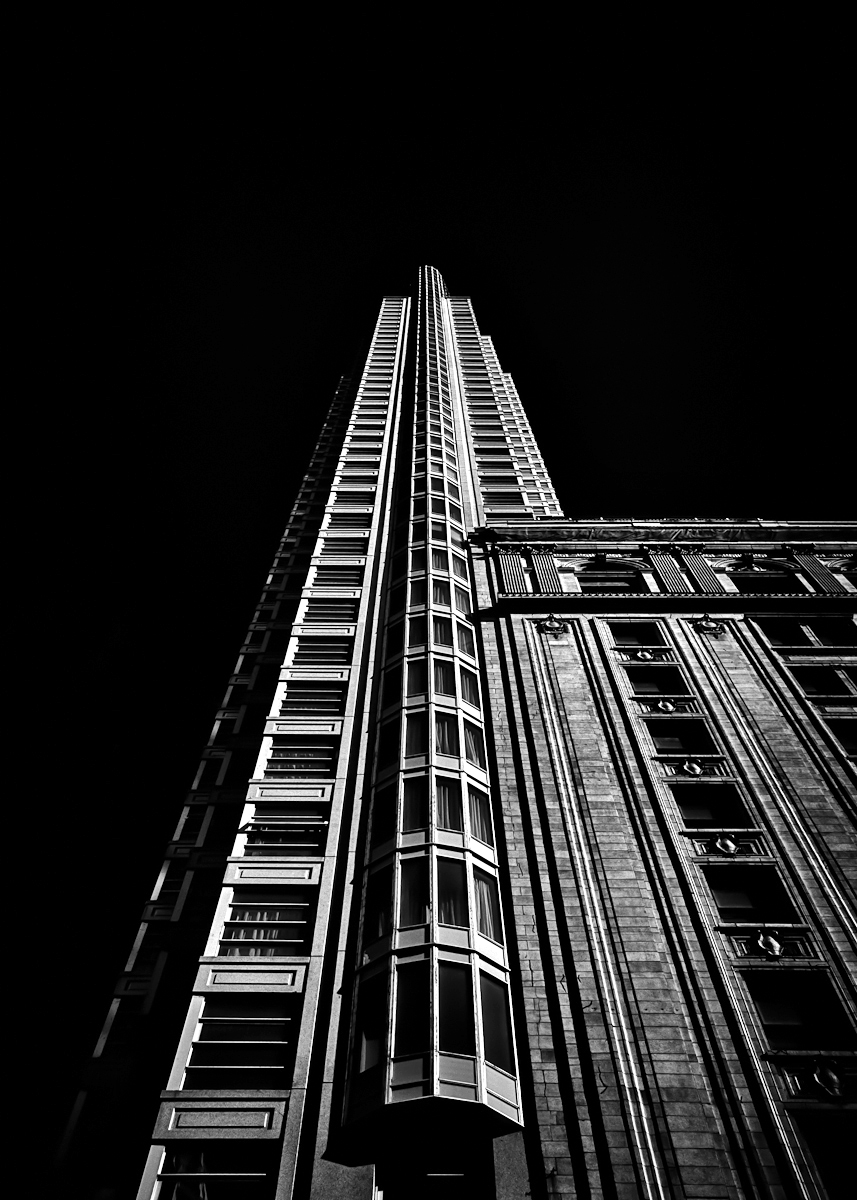 No 1 King Street West in Toronto Canada. The 51 storey condominium tower at the corner of King and Yonge Sts is the tallest residential building in Canada and has the most slender height to width ratio of in the world. Canon EOS 60D body with a Sigma 17-70mm f2.8 DC Macro OS lens. Silver EFEX Pro as a Lightroom plugin for the B&W conversion. Brian Carson The Learning Curve Photography www.thelearningcurvephotography.tumblr.com