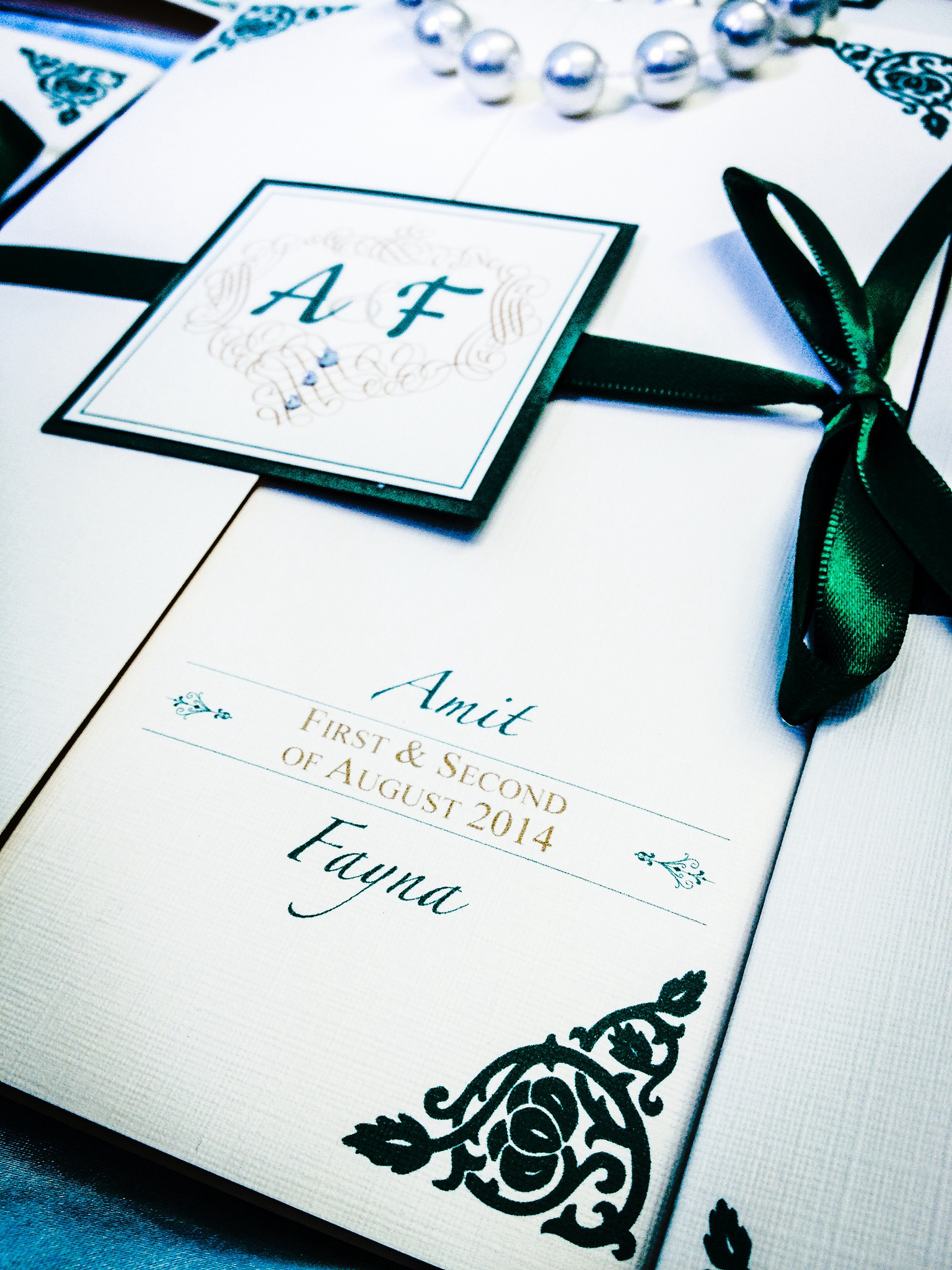 Vintage bespoke green gatefold wedding invitation
