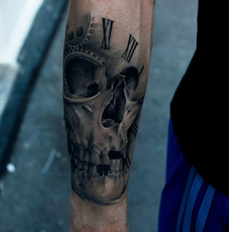 black-tattoo-for-men-skull-and-time