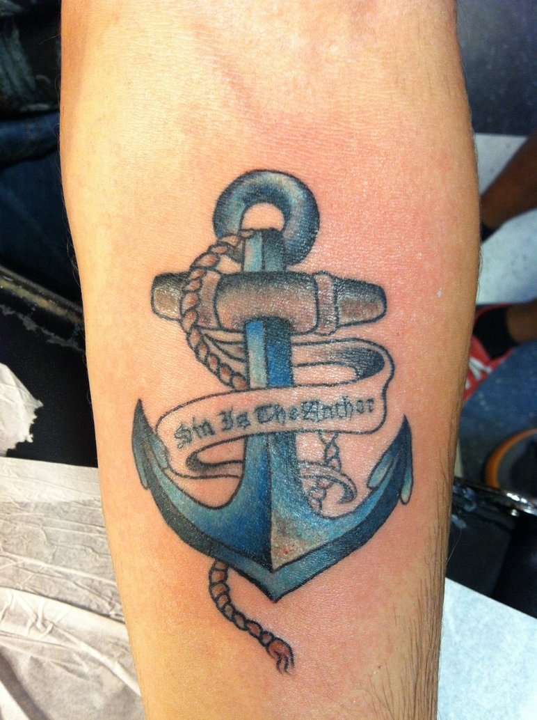 blue-ink-anchor-with-banner-tattoo-on-arm