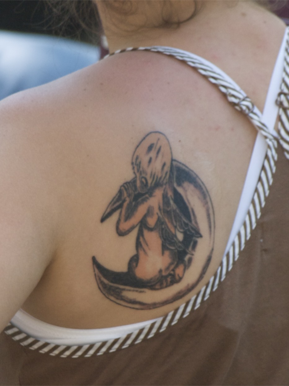cherub-with-crescent-moon-tattoo-on-back-shoulder
