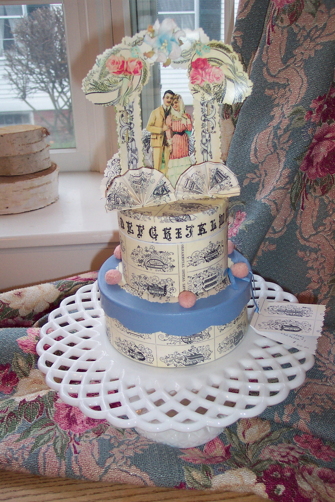 handmade cake topper using vintage style papers