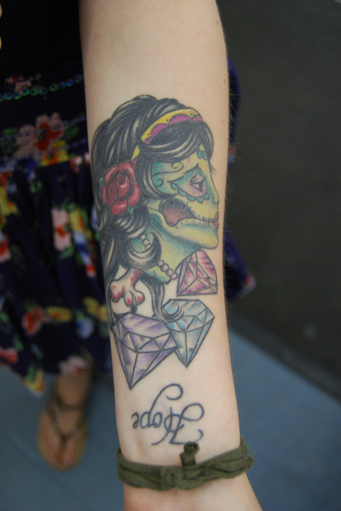 nu skool zombie gypsy tattoo on forearm