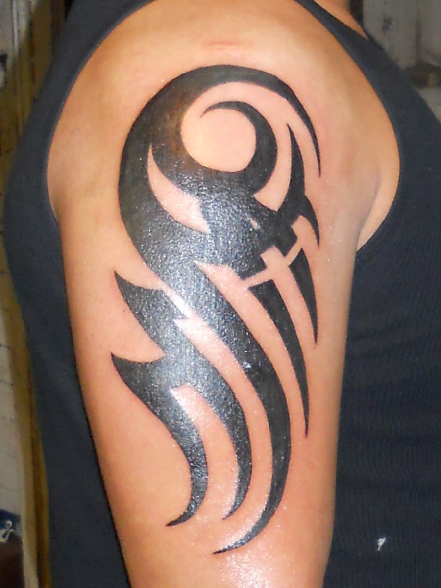 tribal-tattoos-on-the-arm--image-tribal-arm-tattoos-designs-and-ideas
