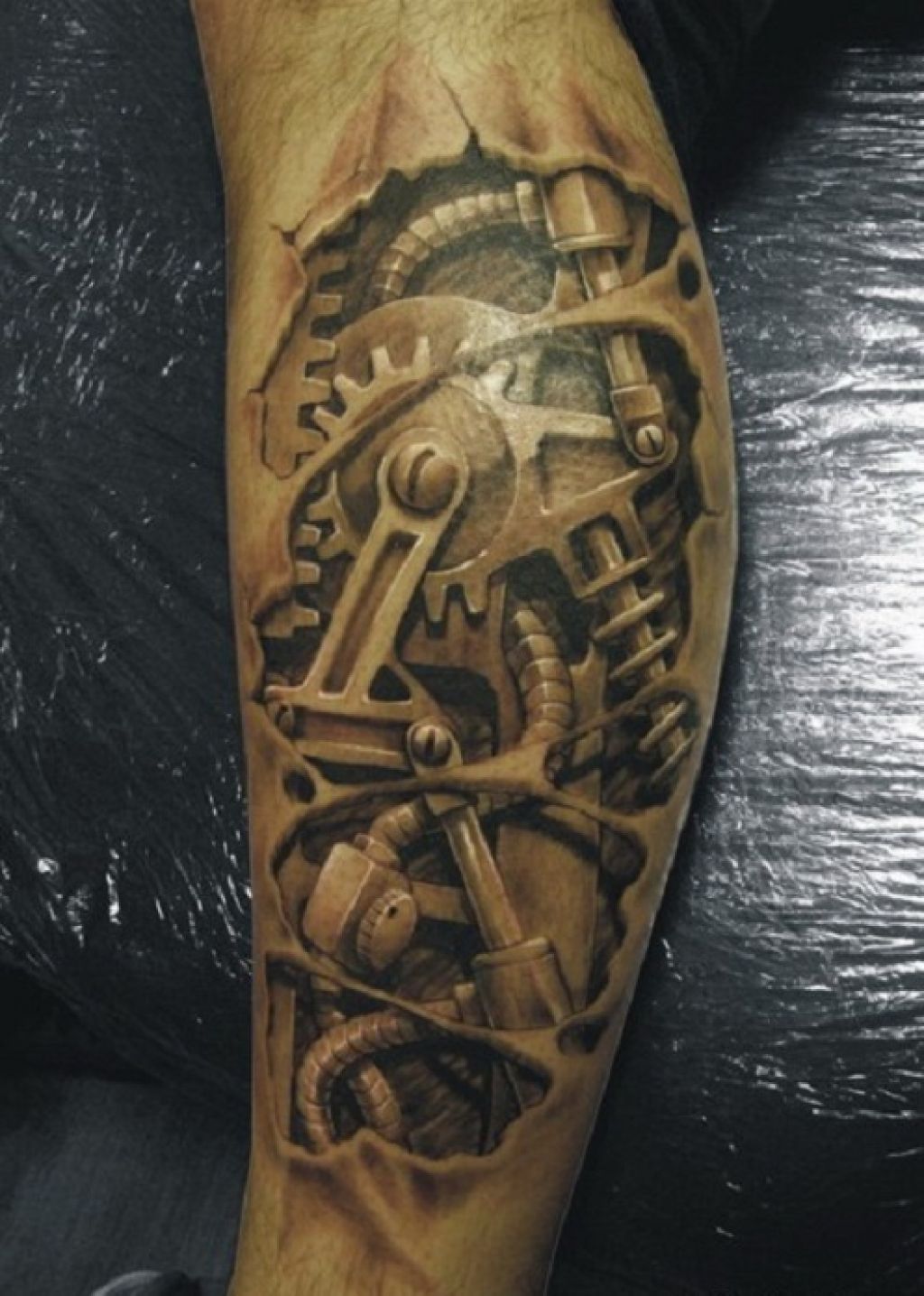3d-machine-tattoos-design-on-men-arm