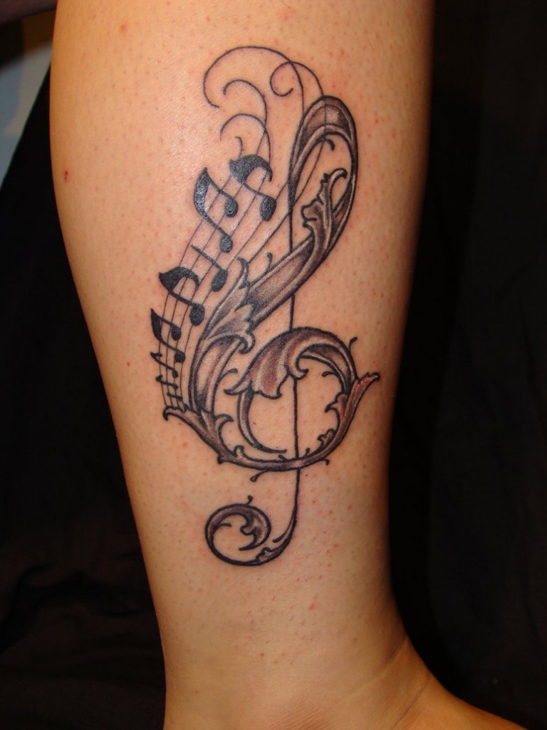 Cool-tattoo-images-music-on-arm-for-girls