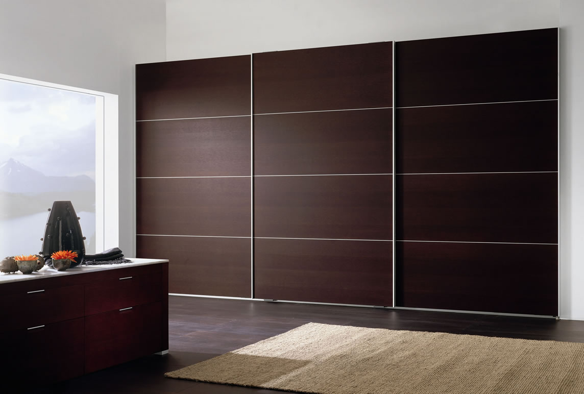 Furniture-Modern-brown-italian-built-in-wardrobe-design-inspiration-with-three-sliding-doors-in-white-themed-bedroom-impressive-lavish-bedroom-wardrobes-and-modern-closets
