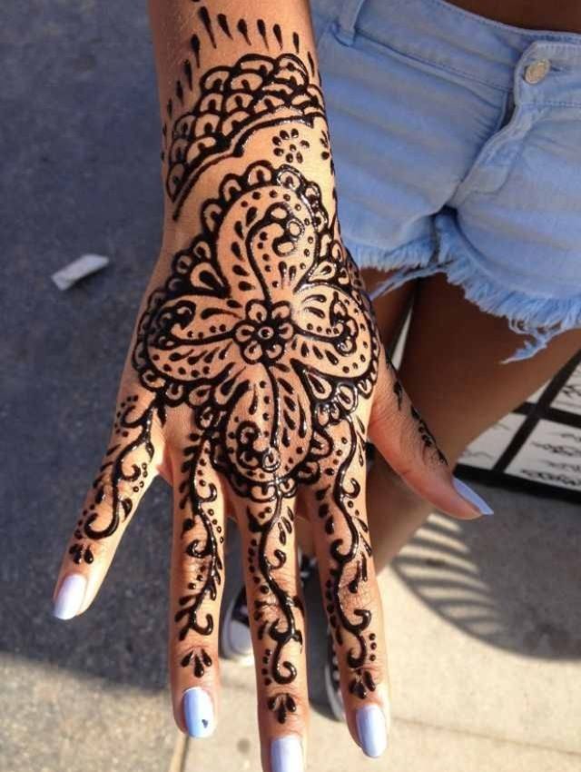 Henna hand tattoo