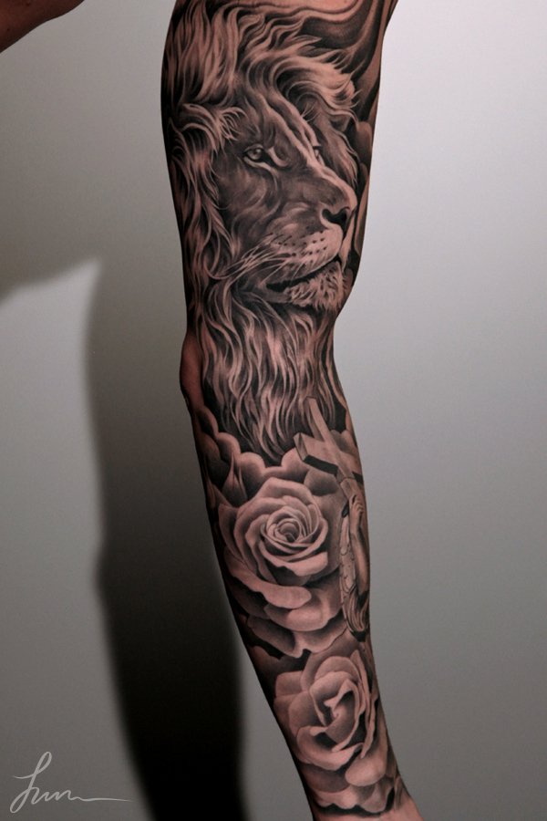 Lion-and-flowers-full-sleeve-tattoo