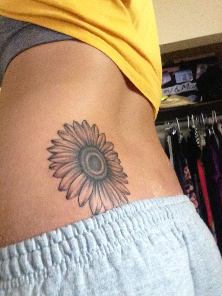 Simple Sunflower Tattoo on Lower Back