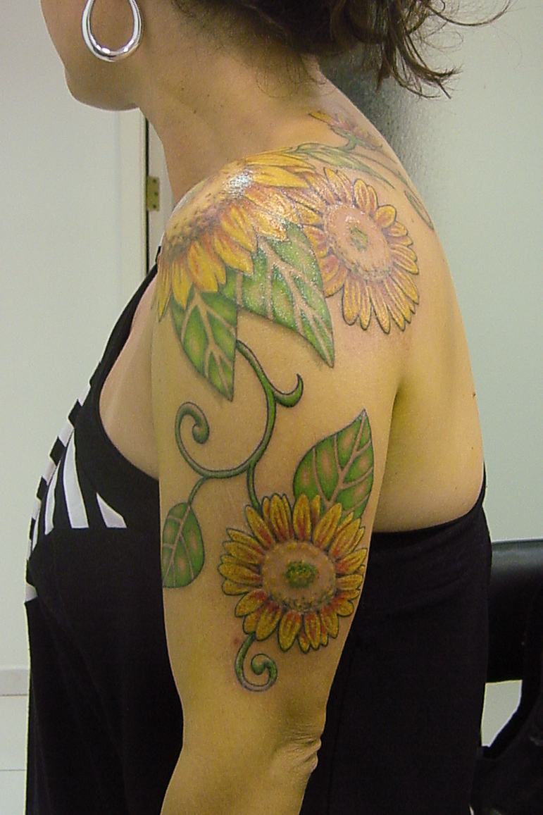 Sunflower on arm tattoo