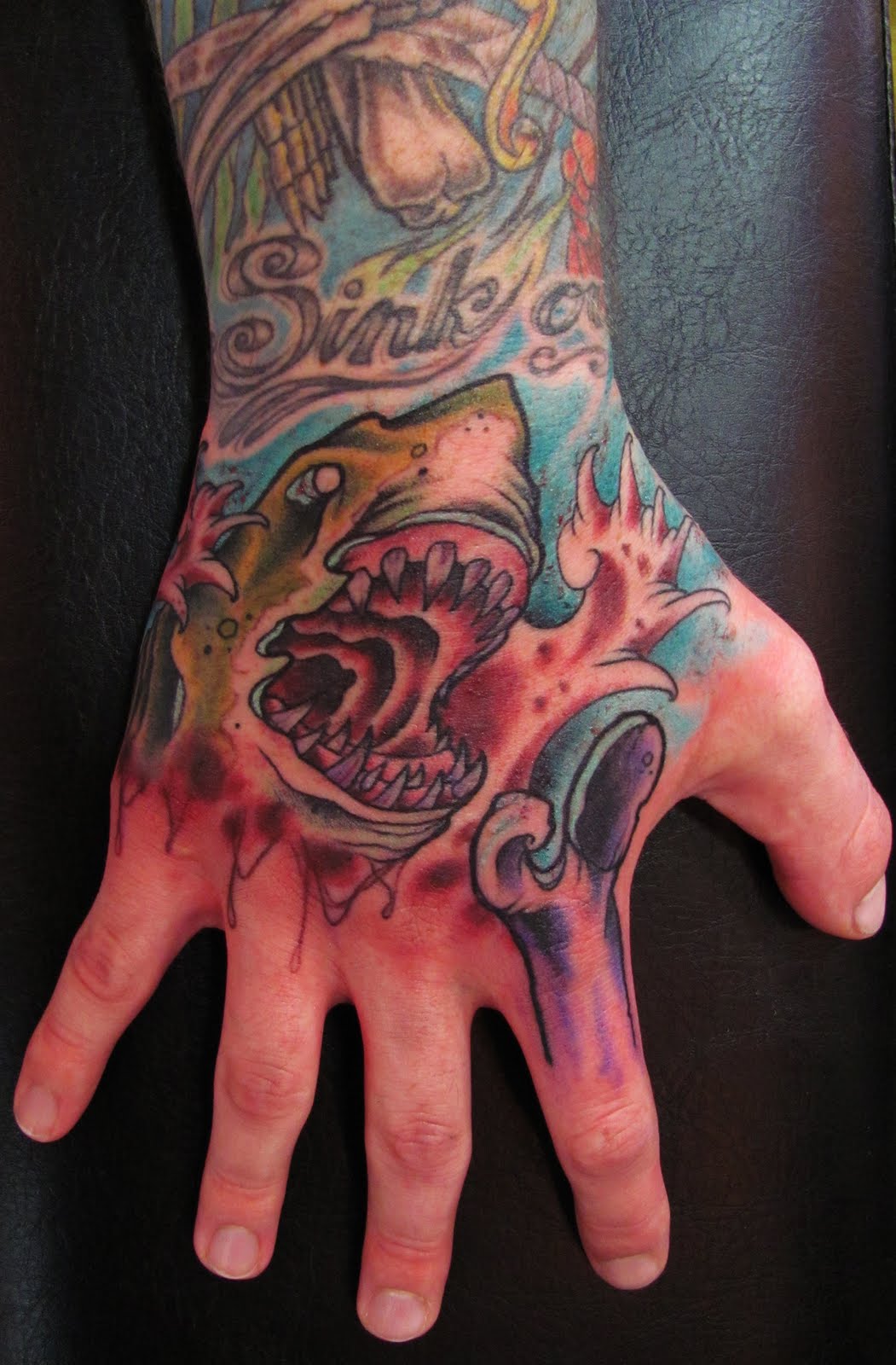 angry-shark-hand-tattoo-design