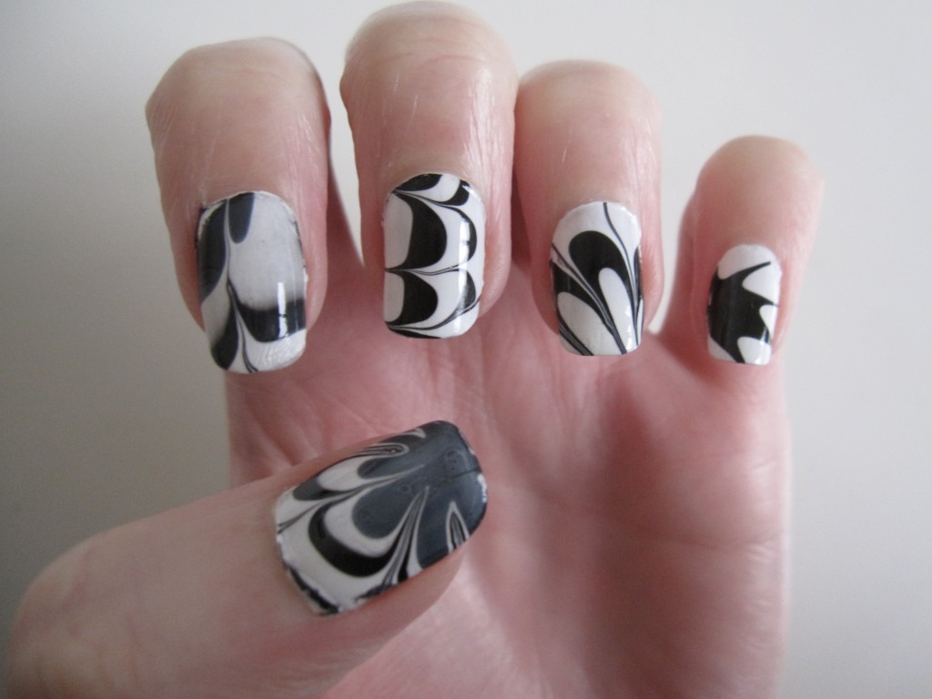 black white water marble nail art