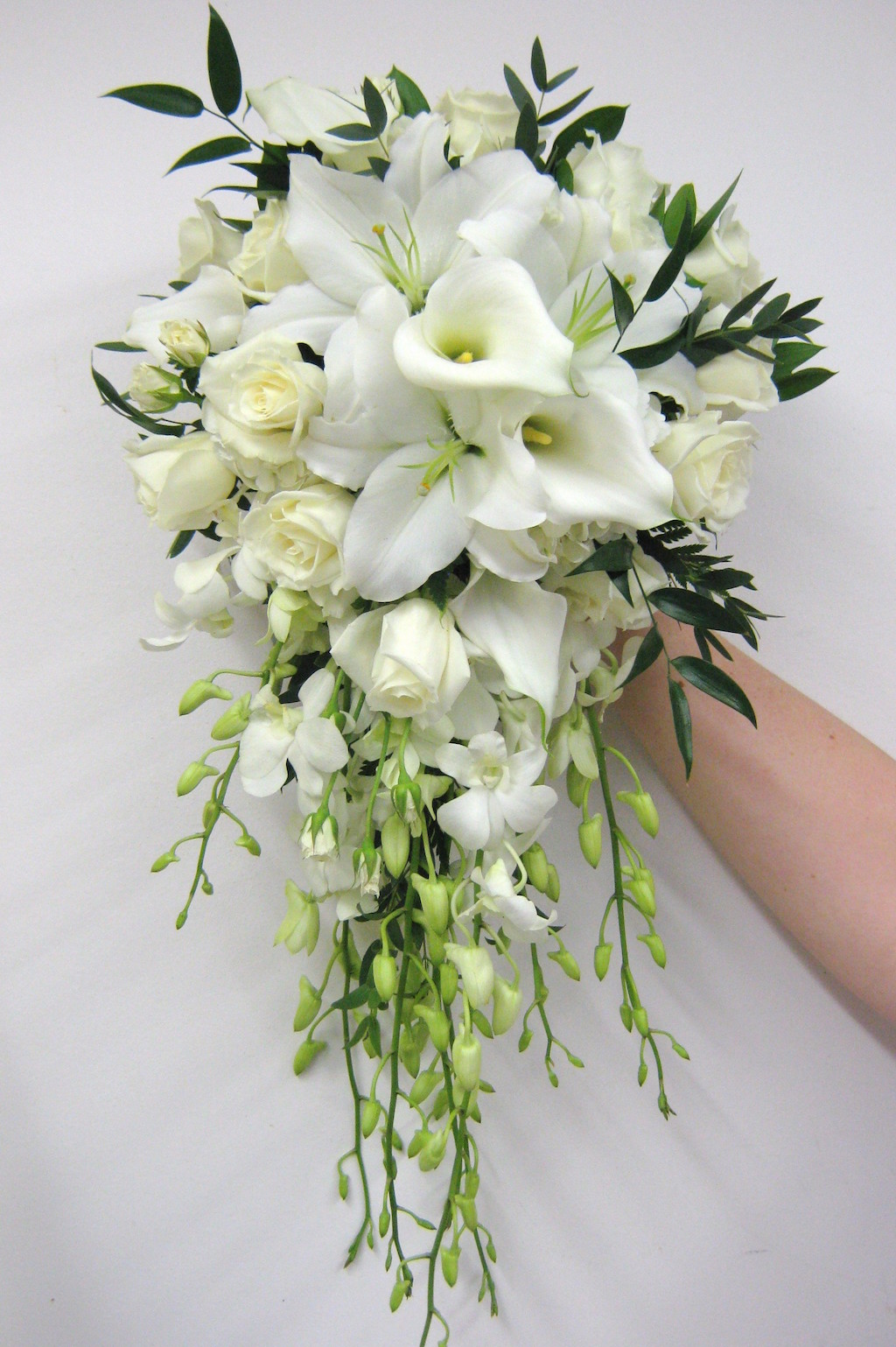 bridal bouquet was a classic cascade style and included orchids