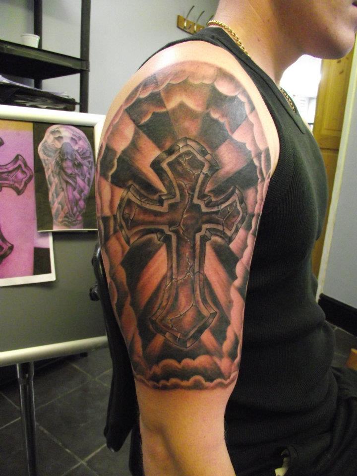 half-sleeve-cross-tattoo-design