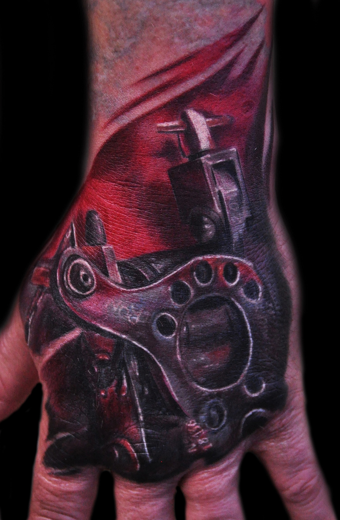 metal-hand-tattoo