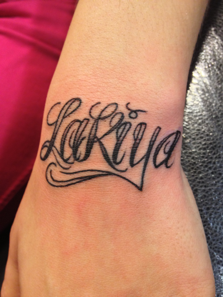 script name wrist tattoo by Wes Fortier
