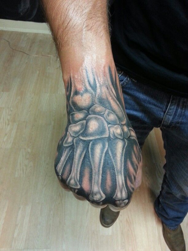 skeleton hand tattoo by jeremiah klein