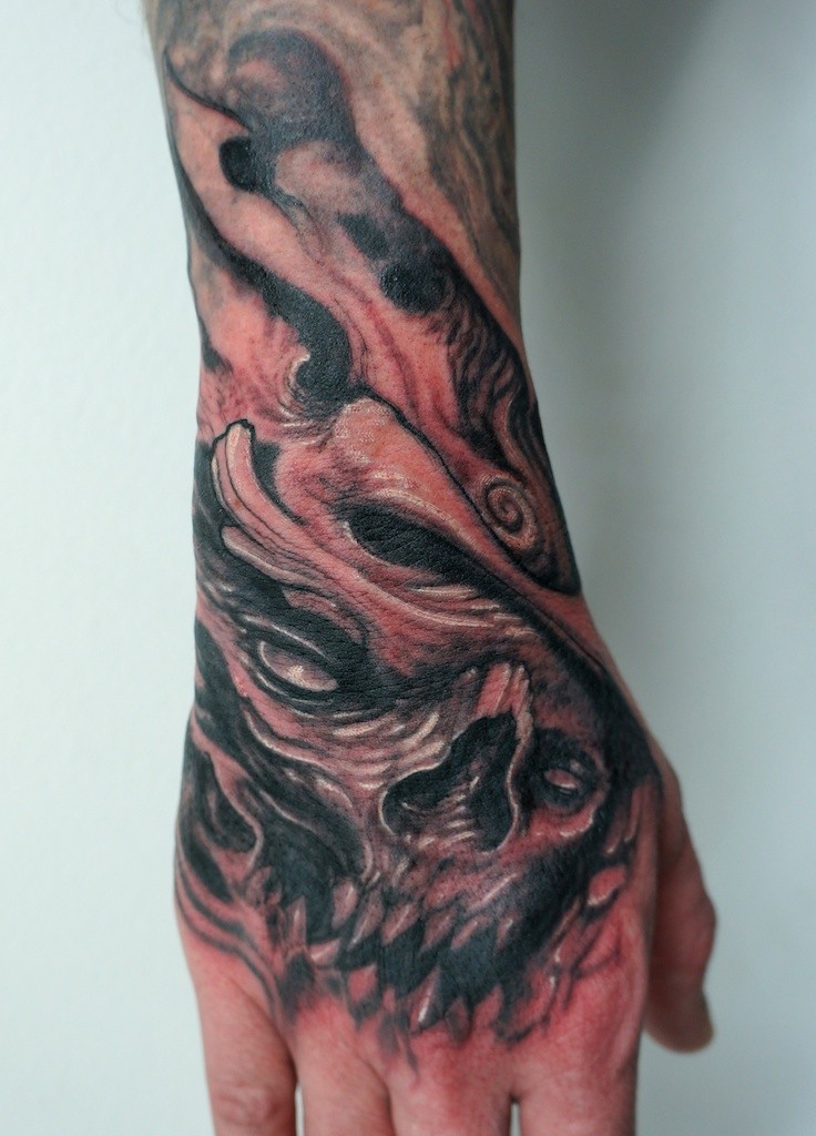 skull_hand_tattoo_by_graynd