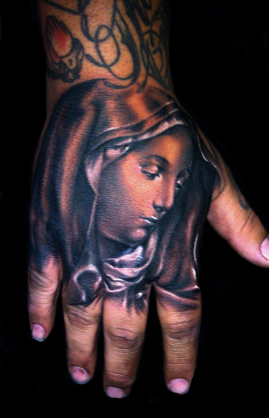 virgin_delorosa_hand_tattoo_by_hatefulss