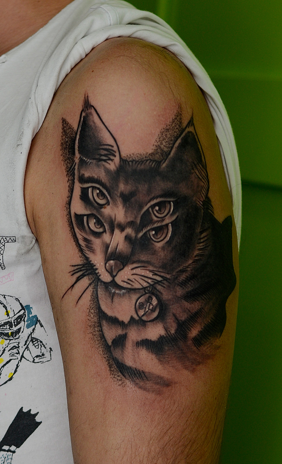 Amazing Four Eyed Cat Tattoo On Arm