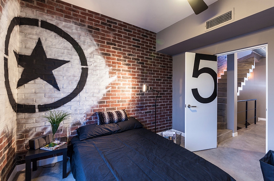 Brick walls with graffiti in the industrial bedroom