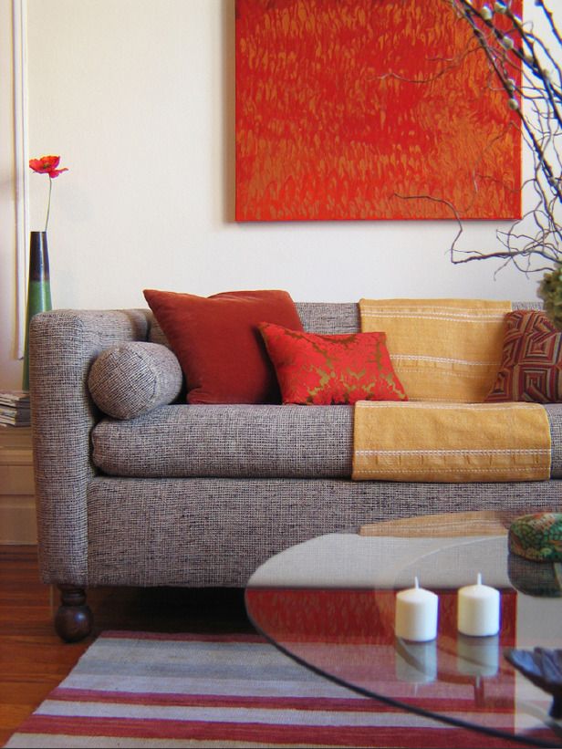 Designer Greta Goss used deep orange and red in this Asian-inspired living room