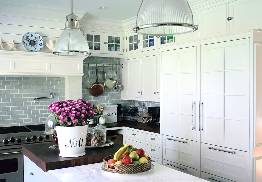 Eclectic-kitchen-in-white-with-contemporary-pendants