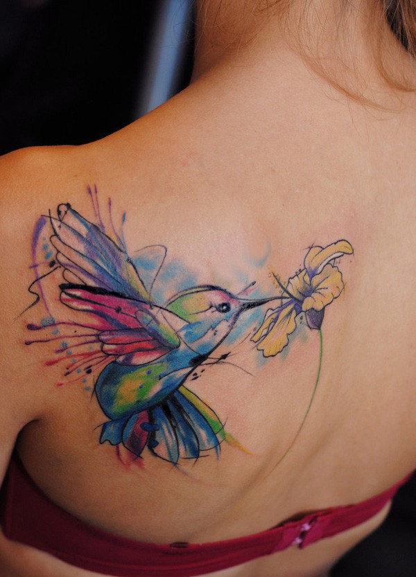 Watercolor hummingbird tattoo on back
