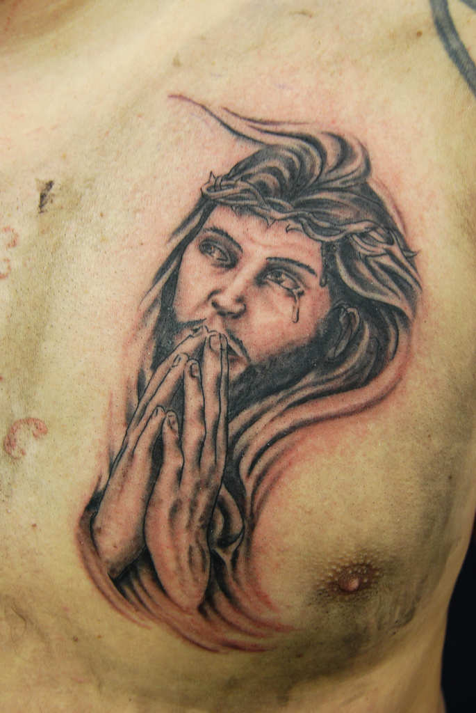 praying jesus tattoo on chest