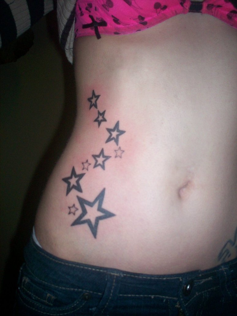 rib star tattoo by Iluvdbush