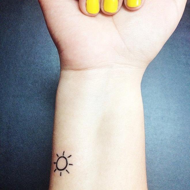 small sun tattoo