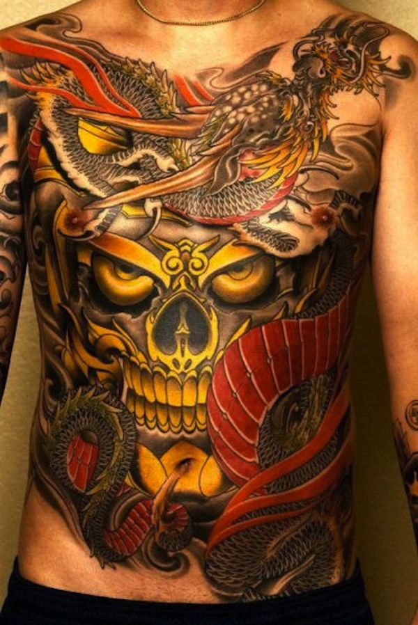 stomach-tattoo-colorful-skull