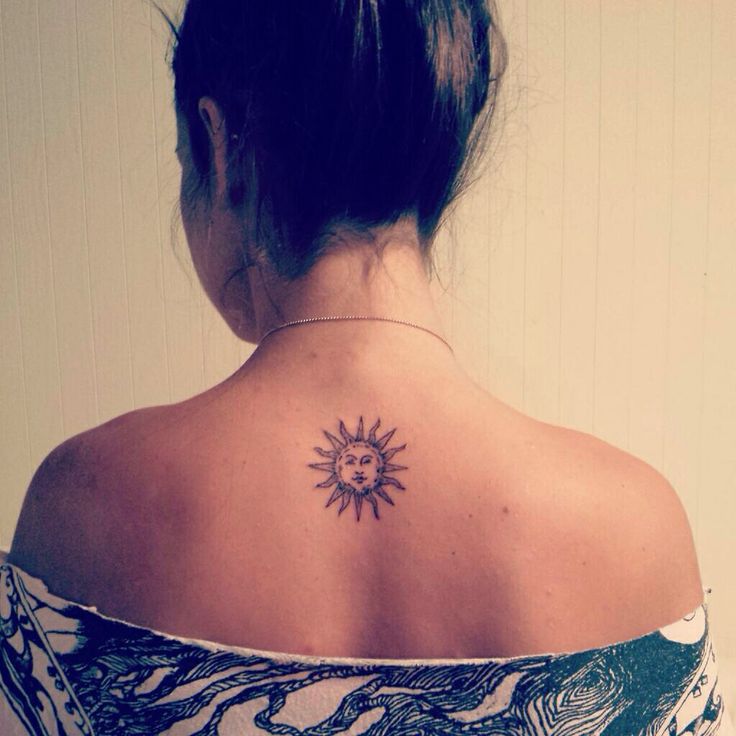 sun tattoo on back