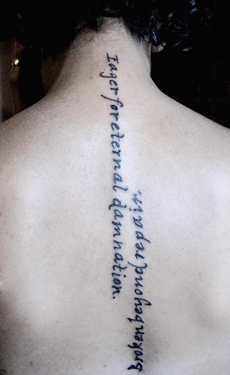 Awful Black Ink Script Spine Tattoo