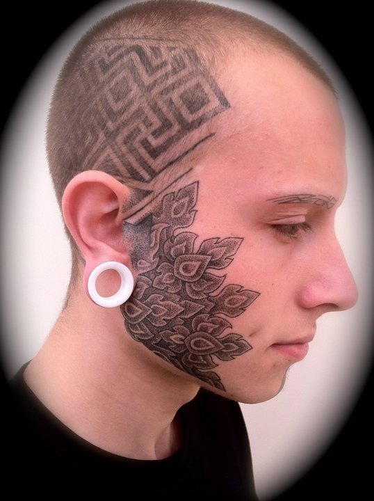 20 Awesome Face Tattoo Designs