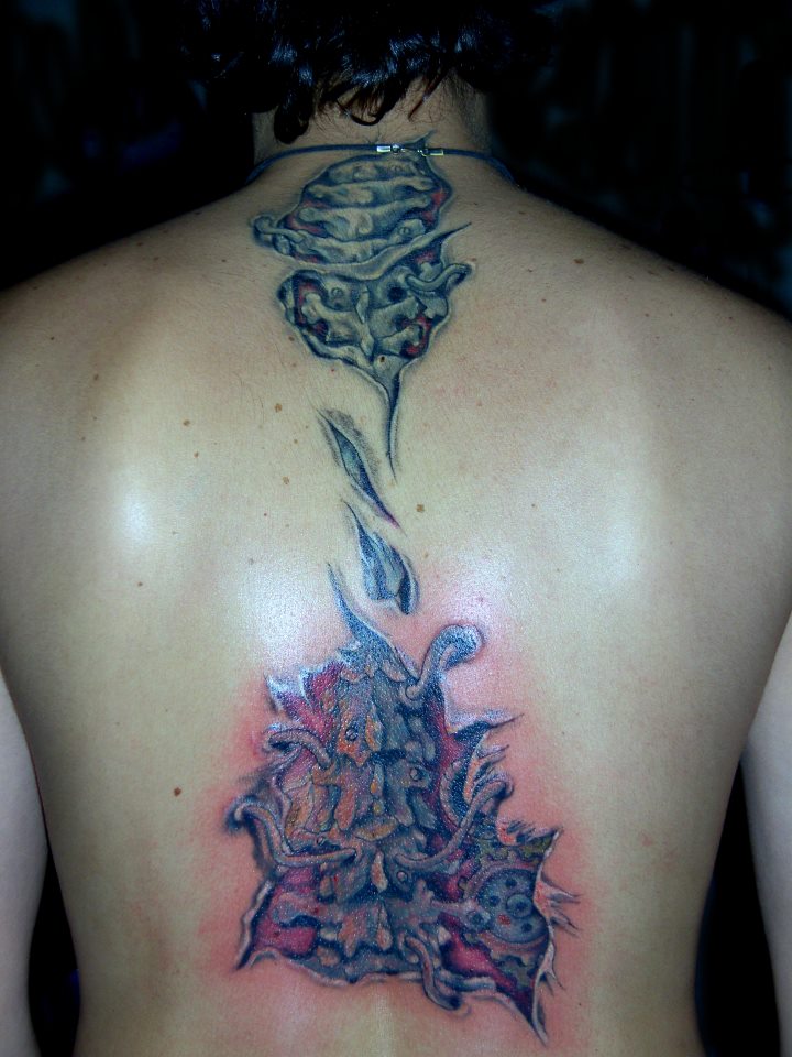 Ripped Skin Spine Tattoo For Men