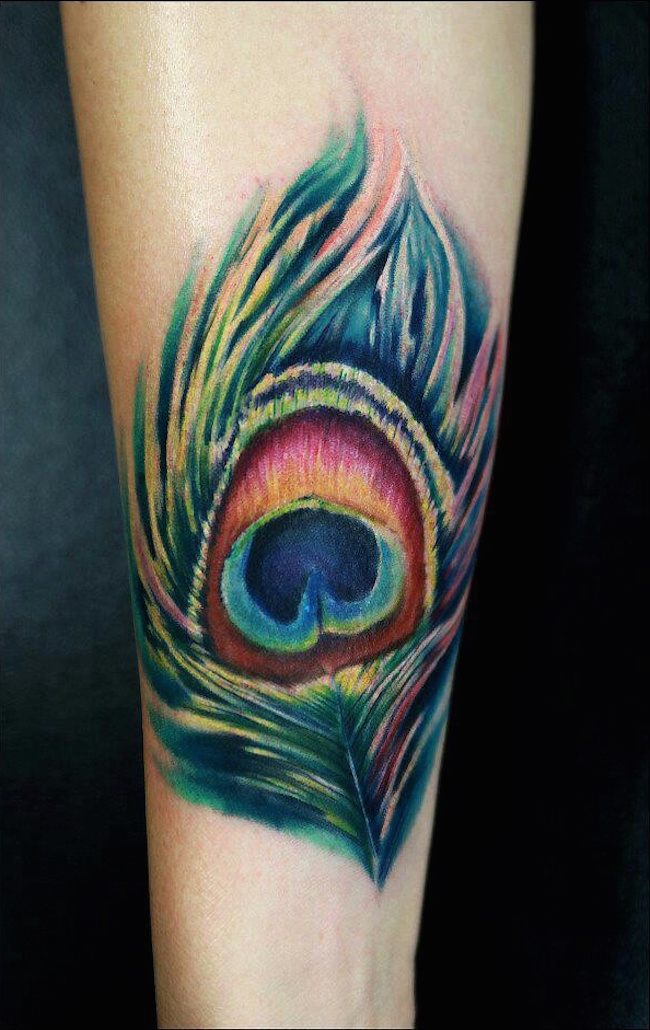 beautiful peacock feather tattoo