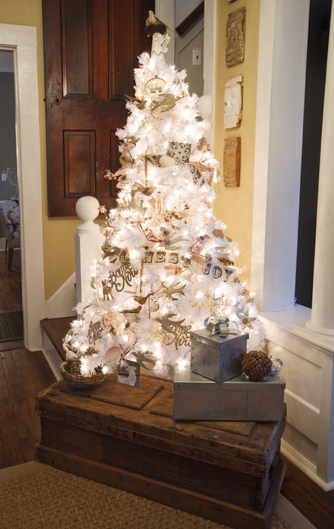 Awesome Christmas tree with white color combined with gold and silver colored accessories
