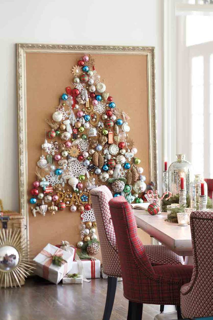 hang vintage ornaments on the wall for a faux-tree