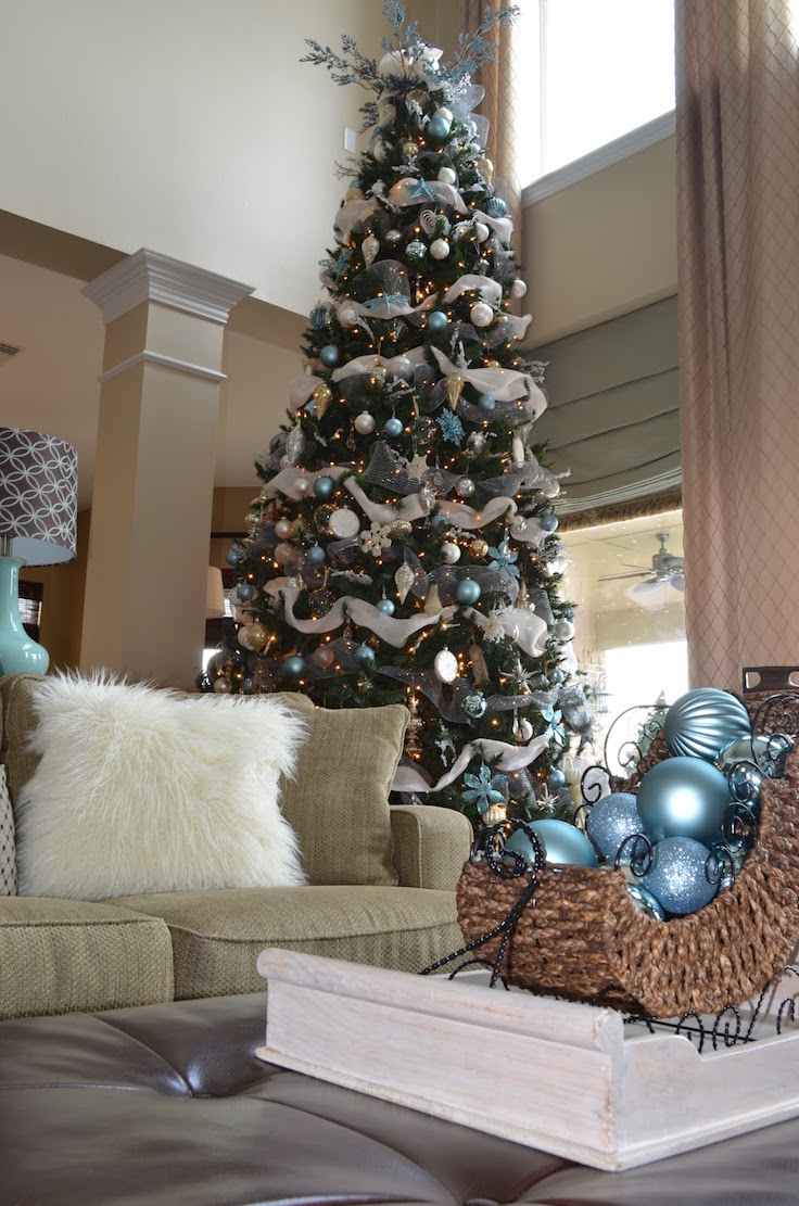 modern christmas interior decorations featuring white mesh ribbons garland and white blue silver colors christmas ball ornaments
